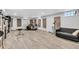 Spacious finished basement with gray flooring, acoustic panels, and neutral decor at 1618 Villa Ave, Indianapolis, IN 46203