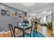 Bright dining area with modern table, seating, stylish lighting, and an open layout at 1618 Villa Ave, Indianapolis, IN 46203