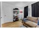 Cozy living room with new flooring, modern shelving and decor at 1618 Villa Ave, Indianapolis, IN 46203