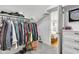 Walk-in closet with built-in shelving and ample hanging space at 1618 Villa Ave, Indianapolis, IN 46203