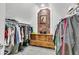 Spacious walk-in closet with hanging racks, shelving, and a built-in dresser at 1618 Villa Ave, Indianapolis, IN 46203