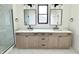 Bathroom features a double vanity with modern fixtures and a glass-enclosed shower at 1654 Fernley Dr, Westfield, IN 46074