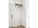 A mud room style entryway with hooks and a shelf at 1654 Fernley Dr, Westfield, IN 46074