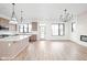 Spacious open-concept kitchen with stainless steel appliances, island, and bright natural light at 1654 Fernley Dr, Westfield, IN 46074