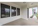 Rear porch featuring white siding and black trim at 1654 Fernley Dr, Westfield, IN 46074