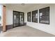 Back porch featuring a sliding glass door, white siding, and dark trim at 1654 Fernley Dr, Westfield, IN 46074
