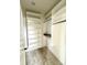 Bright walk-in closet with built-in shelving and hanging rods for optimal storage at 1654 Fernley Dr, Westfield, IN 46074