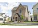 Attractive front view of this two-story home, featuring mixed brick and siding and manicured front yard at 1655 Carrollton Rail Dr, Westfield, IN 46074