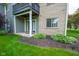 Backyard featuring a small patio, lawn and garden area at 207 Keats Ct # 102, Carmel, IN 46032