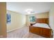 Cozy bedroom with a large window and natural light at 207 Keats Ct # 102, Carmel, IN 46032