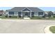 Attractive community building with manicured landscaping and gated access to the pool at 2253 Jaybird Dr, Greenfield, IN 46140