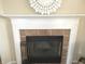 Elegant fireplace with a decorative white mantel and hearth, complemented by an ornate wall accent at 2253 Jaybird Dr, Greenfield, IN 46140