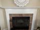 Elegant fireplace with a decorative mantel and tiled surround, perfect for cozy evenings at 2253 Jaybird Dr, Greenfield, IN 46140