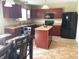 Well-equipped kitchen with stainless steel appliances and a functional center island at 2253 Jaybird Dr, Greenfield, IN 46140