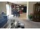 Inviting living room featuring an open floor plan with a spacious kitchen and a dining area at 2253 Jaybird Dr, Greenfield, IN 46140