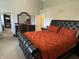 Bright main bedroom with a walk-in closet and a dresser with a mirror at 2253 Jaybird Dr, Greenfield, IN 46140