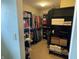 Organized walk-in closet with shelving units for clothes and shoes at 2253 Jaybird Dr, Greenfield, IN 46140