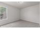 Bedroom with carpet flooring and a window allowing for lots of natural light to enter the space at 2270 Collins Way, Greenfield, IN 46140