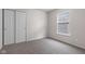 Bright bedroom with a window and closet, providing ample storage and natural light at 2270 Collins Way, Greenfield, IN 46140