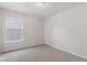 Bedroom featuring carpet flooring, a window for natural light, and a closet at 2270 Collins Way, Greenfield, IN 46140