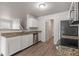 Kitchen with granite countertops, white cabinets, and stainless steel appliances at 2270 Collins Way, Greenfield, IN 46140