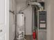 Utility room featuring a water heater and HVAC system for efficient home maintenance at 2270 Collins Way, Greenfield, IN 46140