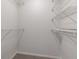 Walk-in closet with carpet flooring and white wire rack shelving for optimal storage at 2270 Collins Way, Greenfield, IN 46140