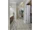 Bathroom featuring a vanity with a sink, a walk-in shower, and a doorway to a walk-in closet space at 2553 Forest Hills Blvd, Greenwood, IN 46143
