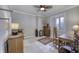 Cozy office with natural light, neutral walls, and ample storage at 2553 Forest Hills Blvd, Greenwood, IN 46143