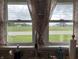 Bright kitchen window offers a view of the countryside at 260 S 250 W, Greenfield, IN 46140