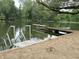 Beautiful lake view featuring a wooden diving board and clear, calm waters at 260 S 250 W, Greenfield, IN 46140