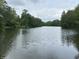A community pond offers a calm place for quiet contemplation at 260 S 250 W, Greenfield, IN 46140