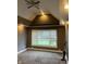 Bedroom with a ceiling fan, and a window with natural light at 319 S Temple Ave, Indianapolis, IN 46201