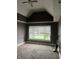 Bedroom with a ceiling fan, and a window with natural light at 319 S Temple Ave, Indianapolis, IN 46201