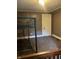 Bedroom featuring a door and a closet at 319 S Temple Ave, Indianapolis, IN 46201