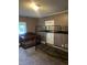Bedroom featuring a window and a closet at 319 S Temple Ave, Indianapolis, IN 46201