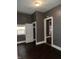 Bedroom featuring a door and a closet at 319 S Temple Ave, Indianapolis, IN 46201