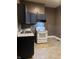 Kitchen with older appliances and ample cabinet storage at 319 S Temple Ave, Indianapolis, IN 46201