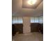 Room with a door and windows at 319 S Temple Ave, Indianapolis, IN 46201