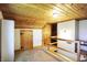 This upper-level open area showcases the unique architecture and design, complete with storage and balcony at 3317 S 100 E, Greenfield, IN 46140
