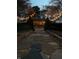A backyard view that features a beautiful stone path and romantic string lights for evening enjoyment at 3317 S 100 E, Greenfield, IN 46140