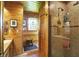 Bathroom showcasing a glass-enclosed shower, tile accents, and a small sink at 3317 S 100 E, Greenfield, IN 46140