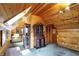 Spacious attic bedroom with charming wood paneling, classic furnishings, and lots of natural light at 3317 S 100 E, Greenfield, IN 46140