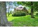 Charming stone home situated on a large lot with mature trees at 3317 S 100 E, Greenfield, IN 46140