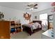 Cozy bedroom with unique decorations, ample closet space, and neutral carpeting at 3362 Pavetto Ln, Indianapolis, IN 46203