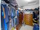 Walk-in closet includes dual hanging rods, upper storage, and drawer storage units at 3362 Pavetto Ln, Indianapolis, IN 46203