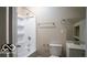 A bathroom featuring a shower-tub combo, toilet, sink, and mirrored vanity for daily convenience at 352 W 28Th St, Indianapolis, IN 46208