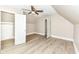 Bedroom features a ceiling fan, a closet, modern floors, and neutral walls at 352 W 28Th St, Indianapolis, IN 46208