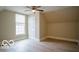 An inviting bedroom showcasing a ceiling fan, window with blinds, and neutral color scheme at 352 W 28Th St, Indianapolis, IN 46208