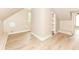 Upstairs hallway featuring modern vinyl flooring and ample space at 352 W 28Th St, Indianapolis, IN 46208